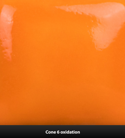 Close-up of orange ceramic glaze with 'Cone 6 oxidation' text at the bottom.